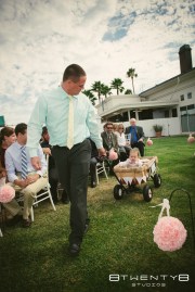 Ring bearer coming through! Love the Red Wagon