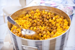 Perfect parting gift wedding favor. The couple's favorite popcorn not only was delicious but shared the groom's name--Garrett's popcorn!