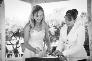 Making it legal! Take a moment when you witnesses sign your marriage license. (using an old wine barrel as a table will do the trick.)