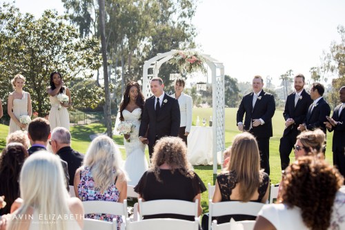 DO: Chandelier crystals sparkle in the sunlight and add a touch of elegance outdoors, at Lomas Santa Fe Country Club DON'T: As officiant it was challenging to stand under the arch in a way that it didn't look like there is a chandelier on my head. Photo by Cavin Elizabeth Photography