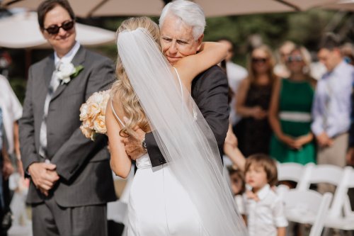 dad-bride hug